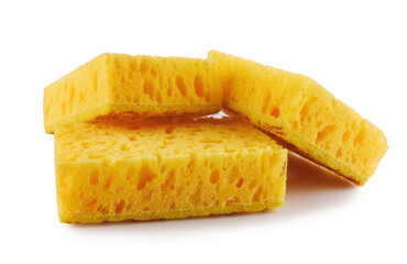 Several yellow sponges for washing dishes isolated on a white background. Household cleaning sponge.