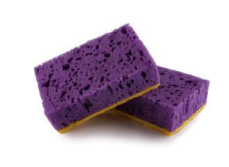 Several purple and yellow dishwashing sponges isolated on a white background. Household cleaning sponge.