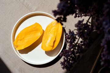 Juicy and delicious yellow exotic summer fruit. Fresh Mango, top view