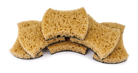 Beautifully arranged curly sponges for washing dishes isolated on a white background. Household cleaning sponge.