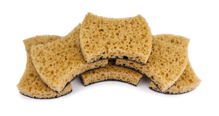Beautifully arranged curly sponges for washing dishes isolated on a white background. Household cleaning sponge.