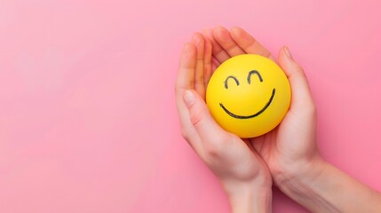 happy smiley face with hands on a pink background