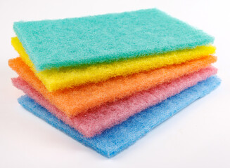 Multi-colored cleaning sponge. Background made from multi-colored cleaning cloth.