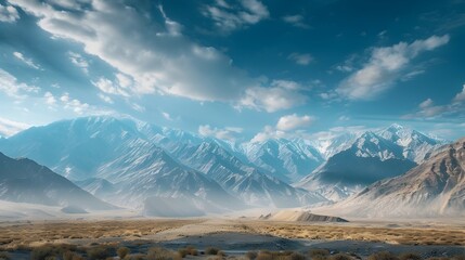 Fototapeta premium Majestic Mountain Range Under Vast Sky Conveying Solitude and Grandeur