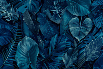 A blue and green leafy background with many different types of leaves