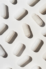 White medcine capsules abstract background