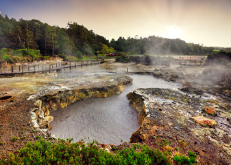 Azores - Furnas, Sunset volcano  landscpae over lake with hot spring and fumarol.