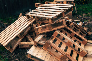 Fototapeta premium Pile of old used wooden Euro Pallets