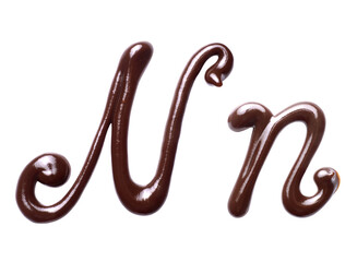 Large and small Letter N of the Latin alphabet made of melted chocolate, isolated on a white...