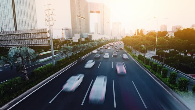 Time lapse of moving traffic in city evening