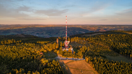 Jauerling mountain with ski area and transmitter tower. Aerial morning view from Austria.