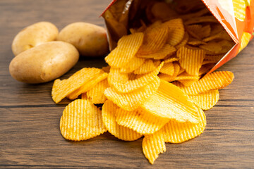 Potato chips, delicious BBQ seasoning spicy for crips, thin slice deep fried snack fast food in...