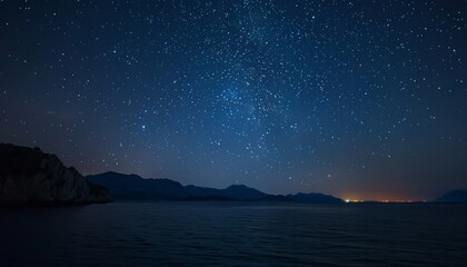 Amazing starry sky over sea at night