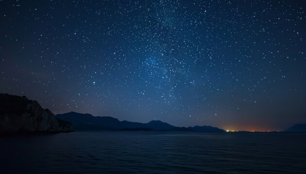 Amazing starry sky over sea at night