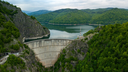 Obraz premium Vidraru Dam - aerial view on a cloudy day