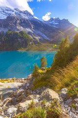 Panorama of Oeschinensee lake and Alps, Switzerland.