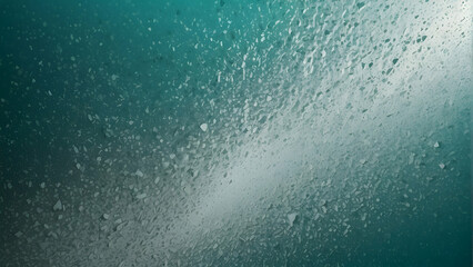 Obraz premium A mesmerizing texture of air bubbles rising through water with a dynamic play of light and gradients