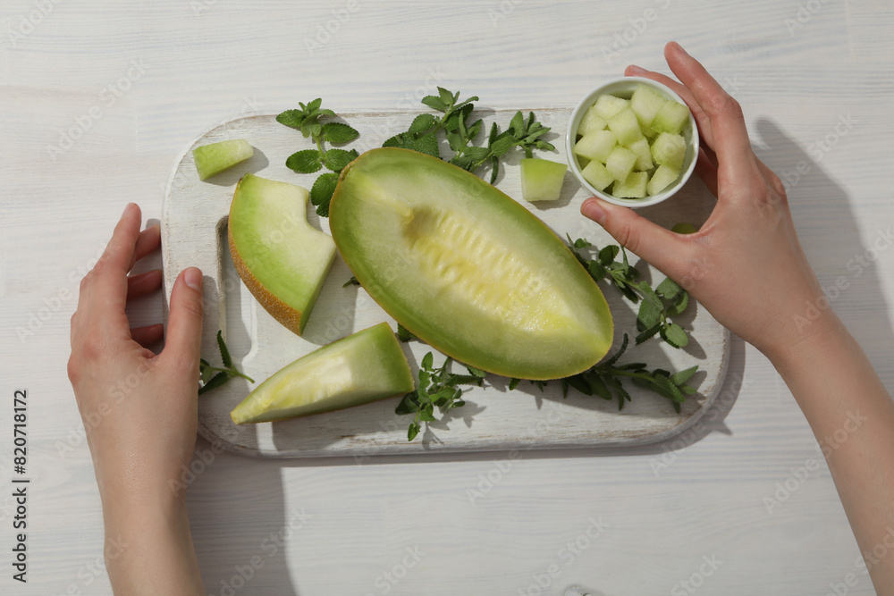 Sticker cut fresh melon on a cutting board