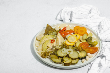 Assorted fermented vegetables. Probiotics, healthy food, vitamins. Vegan lifestyle, pickled dish