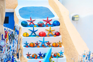 Santorini white and blue colorful style stairs with starfish and seashell decorations