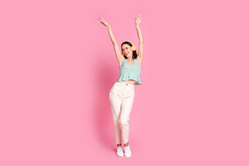 Photo of good mood crazy woman wear trendy clothes have fun club disco music isolated on pink color...