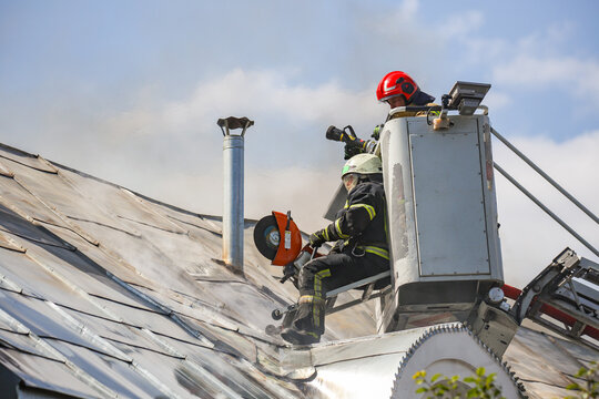 Fire in the church temple. The church cathedral is on fire. Heavy smoke in the temple area. The roof of the cathedral caught fire. Fire in the church.