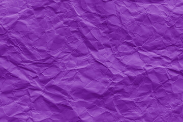Crumpled purple violet paper texture background. Wrinkled paper surface.	
