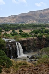 Obraz premium Scenic view of a majestic waterfall cascading down from cliffs. Nile River, Ethiopia, East Africa.