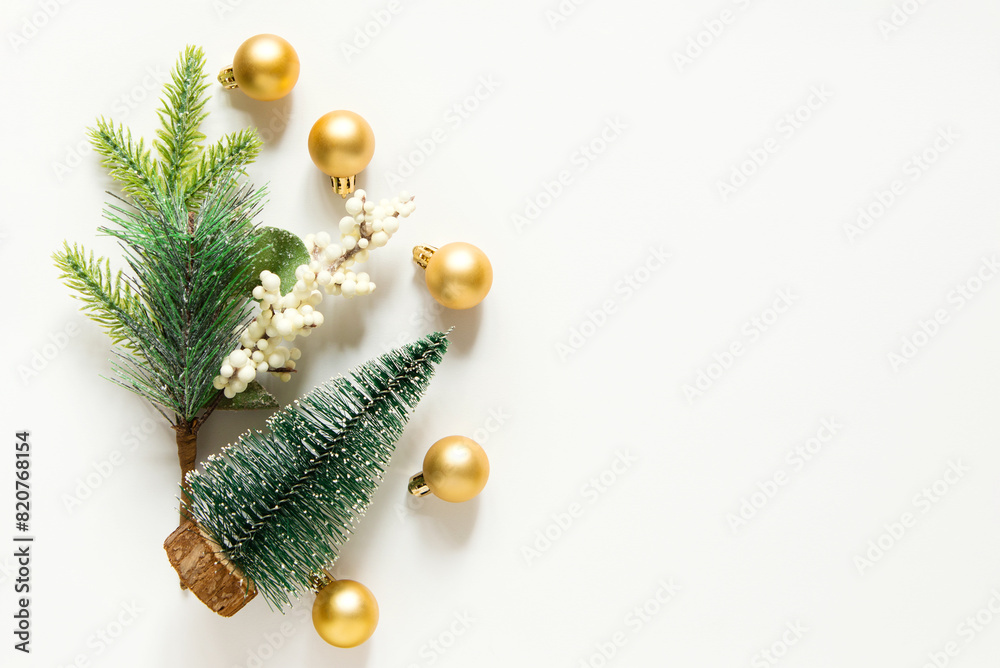 Canvas Prints Festive xmas decoration gold toys. Empty space for copy space. flat lay, top view. new year background with christmas tree on a light white background. 