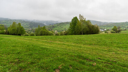 Cloudy springtime day above Lutise village in Slovakia