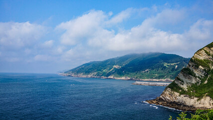 Fototapeta premium Views of the ocean from a hill in northern Spain