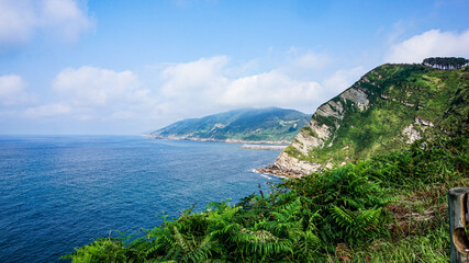 Fototapeta premium Views of the ocean from a hill in northern Spain