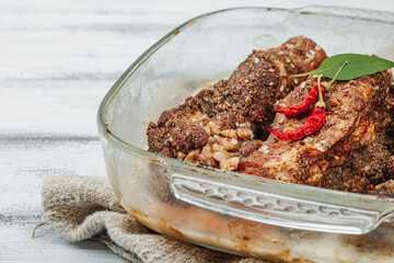 Baked pork ribs with spices, cold fat. Traditional ingredient for BBQ, picnic concept