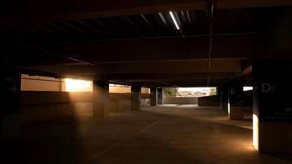 Urban parking garage with a gritty aesthetic, featuring framed windows along the walls