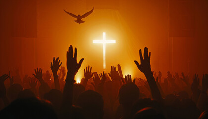 Fototapeta premium Silhouettes of people with raised hands in worship at a Christian rock concert, with a glowing cross and a dove in the background.