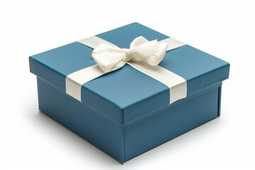 A blue gift box with a white ribbon on a white background. A gift idea. Gift packaging.