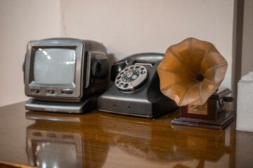 Closeup of vintage electronics on a wooden desk