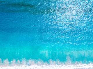 Amazing Top view sea beach landscape background,Summer sea waves crashing on sandy shore seascape...