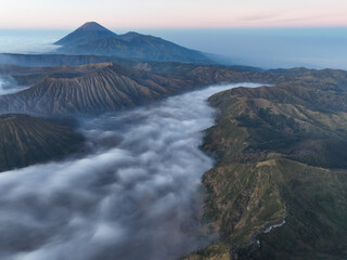 Aerial view Mountains at Bromo volcano during sunrise sky,Beautiful Mountains Penanjakan in Bromo Tengger Semeru National Park,East Java,Indonesia.Nature landscape background