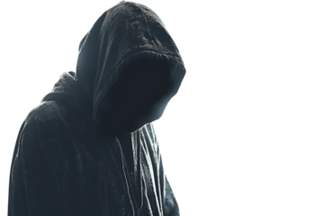 Mysterious figure in hoodie, face obscured, representing anonymity, cyber security, and digital age themes. Perfect for technology and security visuals.