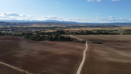 Aerial view of cultivated agricultural fields in the countryside
