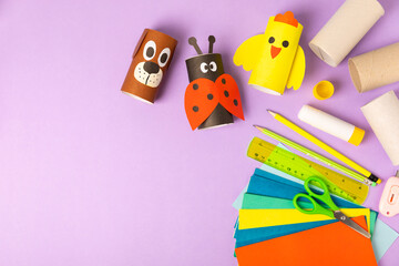 Toilet paper crafts on a colored background. Kids crafts made with toilet paper roll. DIY....