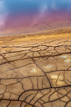 Dried mud patterns and rich red waters at riotinto