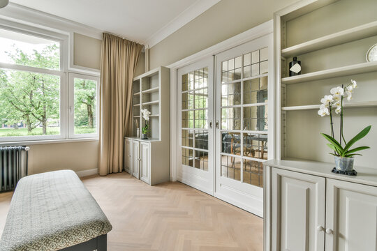 Elegant interior design of a cozy room with garden view