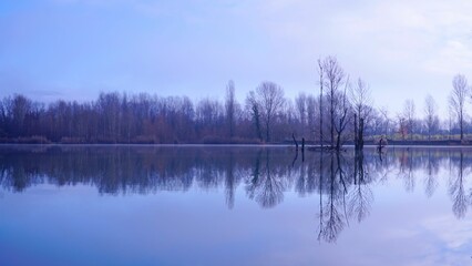 a lake filled with lots of reflections on it's surface