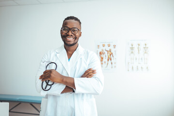 Young man doctor holding a stethoscope on background. Professional medical physician doctor in...