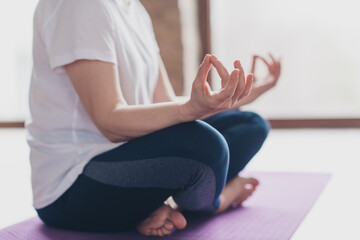 Cropped photo of nice retired woman meditate lotus pose sportswear sport healthy lifestyle workout...