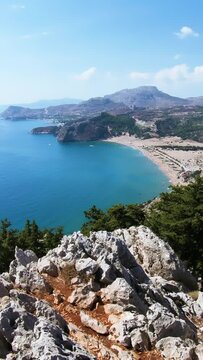 Picturesque view of the Mediterranean coast of Rhodes island with rocks and beaches. Greece. Top view