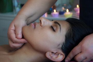 woman getting a massage in a spa