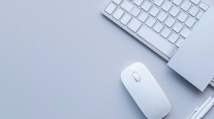 Computer keyboard and mouse on white office desk